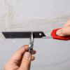 Afbeeldingen van KNIPEX Afbreekmes UNI CutiX 9010165BK